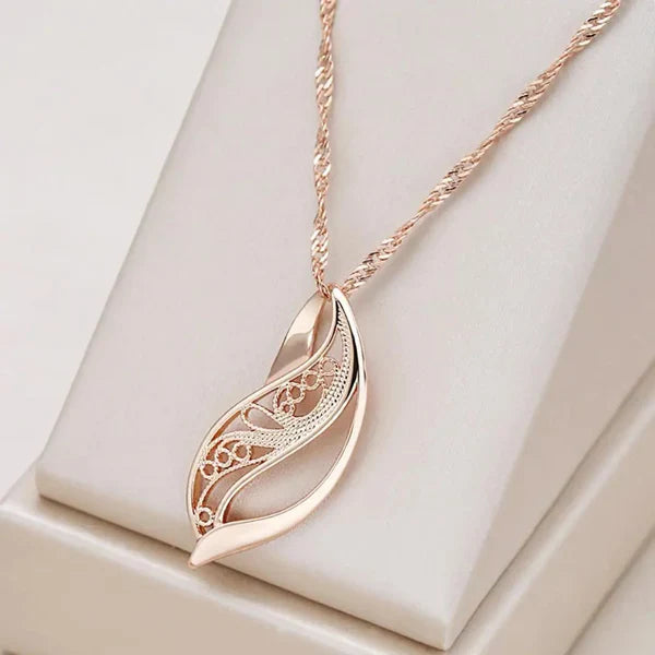 1+1 Offer: Elegant earrings with dark blue crystal in gold + Elegant Harmonious Necklace in Gold